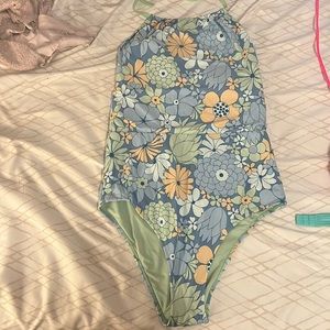 One piece swimsuit that ties at the top